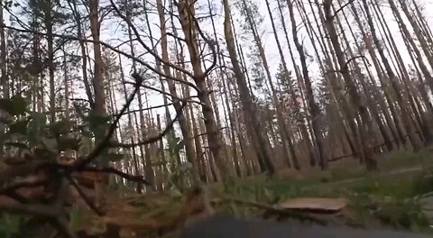 Russian soldier ambushed a Ukrainian fiber optic FPV drone and cut the cable to detonate it.