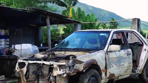 A girl Restoring a car washed away by floods all by herself!
