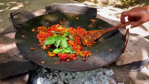 cooking ratatouille in a peaceful forest