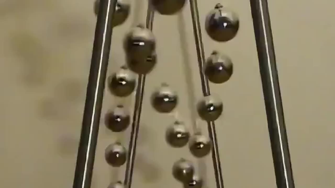 20 uncoupled pendulums of increasing lengths dance and produce visual traveling waves standing waves and beating