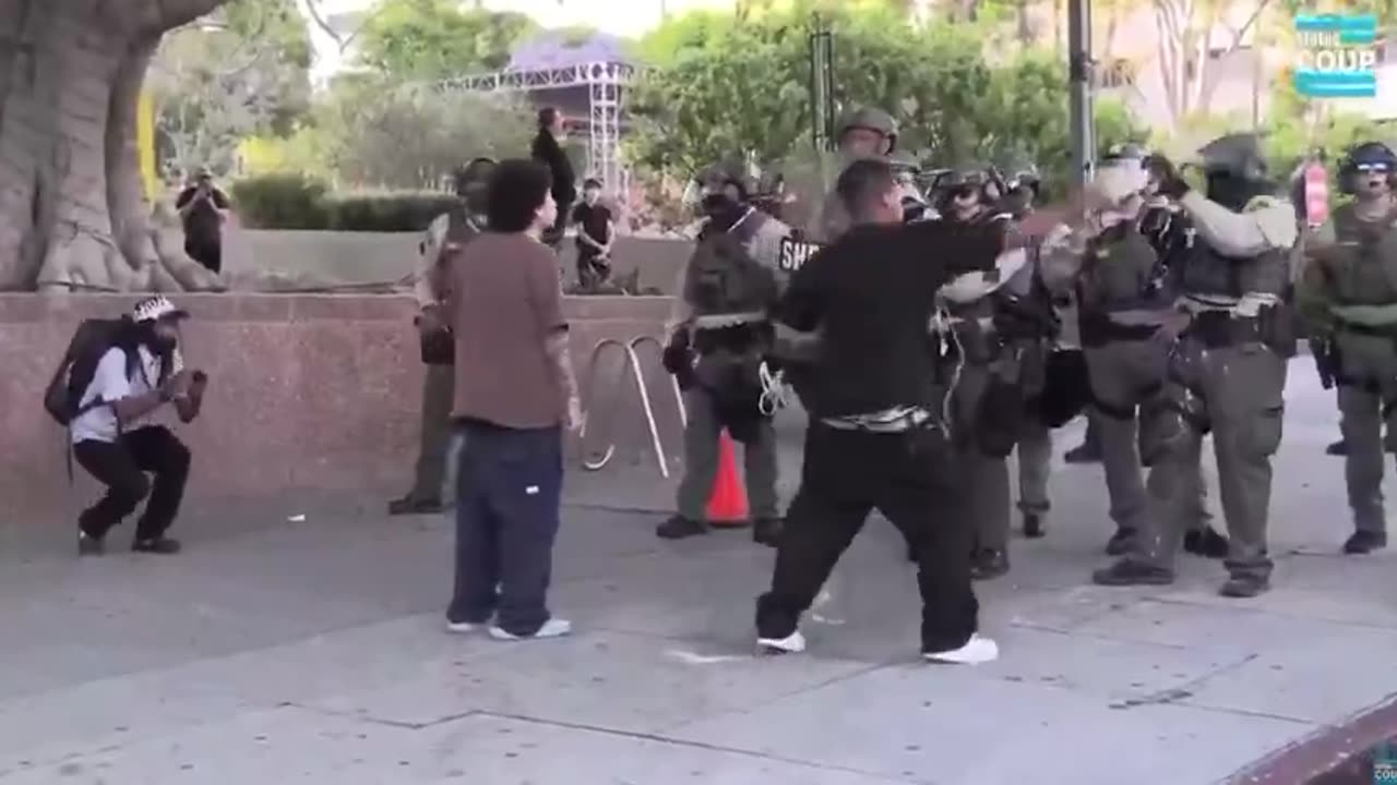 Rioter throws a bottle at LA County Sheriff and gets absolutely LIT UP at close range.