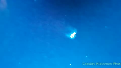 phoenix or supernatural bird comes down from portal over my house