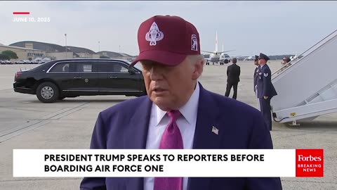 President Trump speaks to reporters before boarding Air Force One