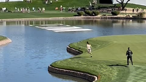 Streaker Jumps Into Water at Waste Management Golf Tournament