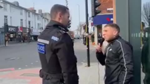 British police confiscate microphone from Christian preacher