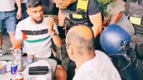 Muslim immigrant is arrested for wearing a HAMAS Palestinian shirt in Germany.
