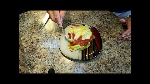 Creamy Rich Raclette Cheese smothering Gourmet Spinach Ravioli