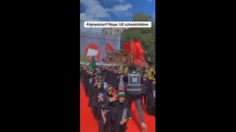 Not Afghanistan. Not Gaza! This is Britain!!! School kids with Hamas Terrorist bands. WAKE UP US!!!