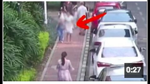 A young Asian woman suddenly collapses & requires urgent medical attention