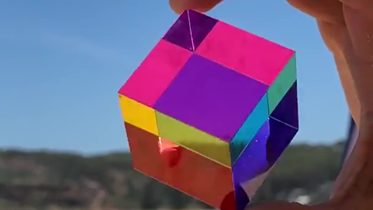 A demo of subtractive color mixing with a CMY cube.