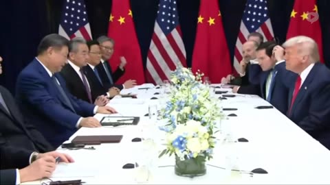 Trump and Xi exchange opening remarks at the negotiating table.