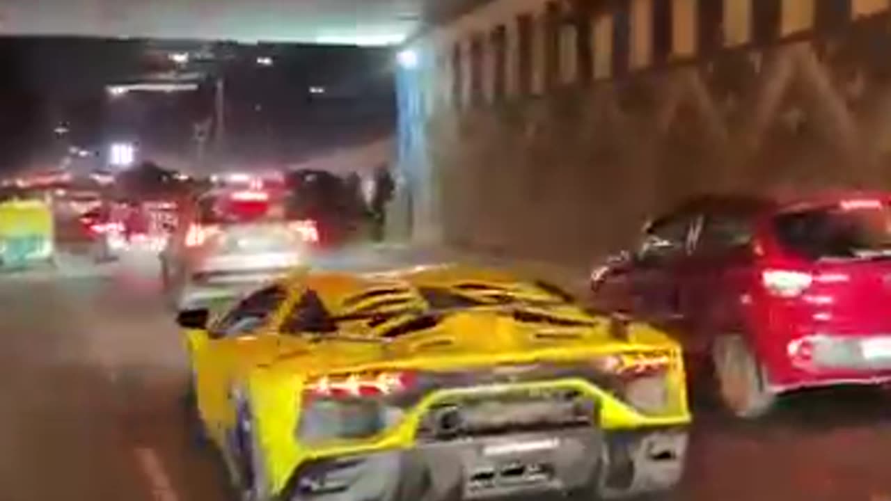 Lambhorgini Exhaust in crowd