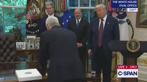 BREAKING⛔️Is Apple CEO bribing Trump with a gold bar on LIVE TV?
			