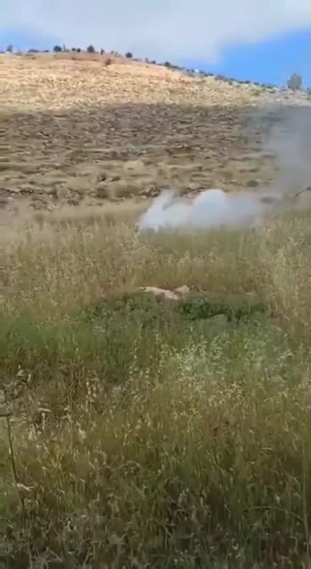 An Off-duty IOF Reservist and a Palestinian Flag