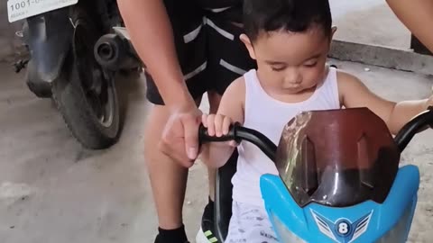 Isaiah riding bike