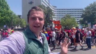 The bused-in anti-Trump May Day open-border protesters are now blocking traffic and marching toward
