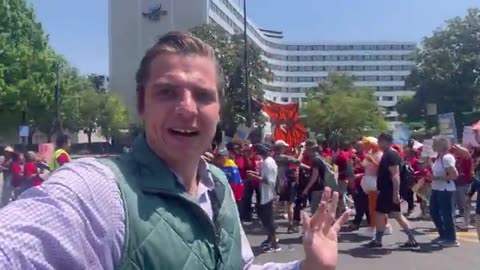 The bused-in anti-Trump May Day open-border protesters are now blocking traffic and marching toward