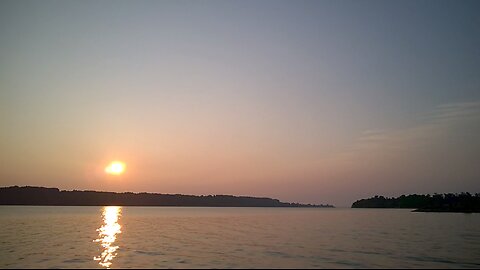 Sun rising over peaceful nature river speed up 64x