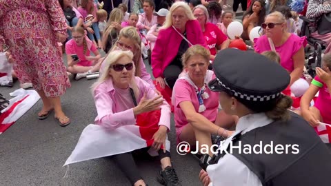 The women and children’s march is now staging a SIT IN outside the Britannia..