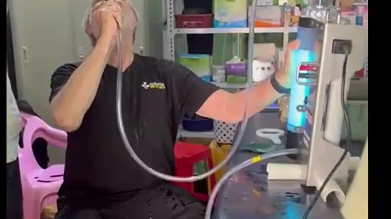 Joe demonstrating a unit for Dr Min and Dr Moe