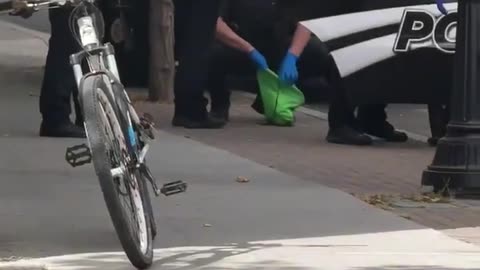 BREAKING⛔️ NEW VIDEO OF A MAN WITH WEAPONS BEING PLACED UNDER ARREST NEAR THE SIGHTING OF THE SHOOTING