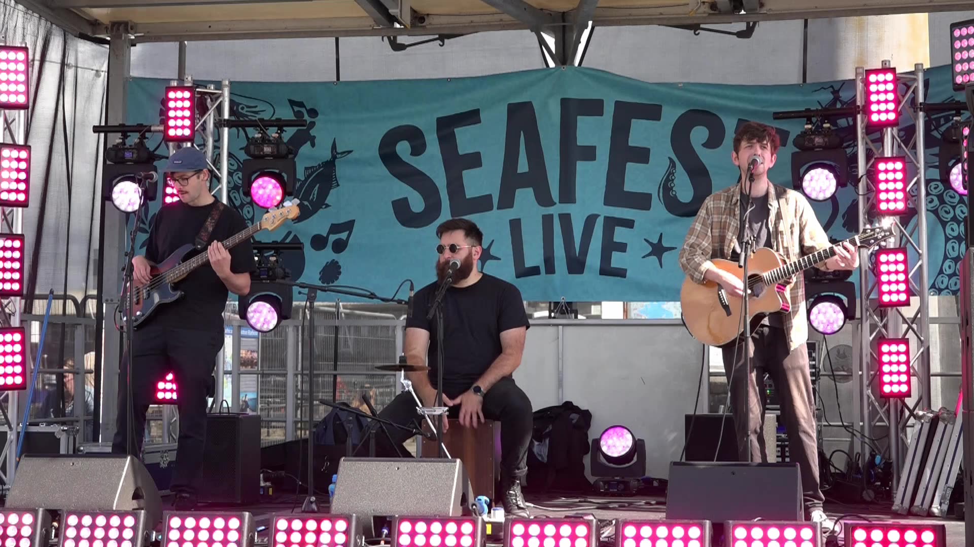 Plymouth Barbican Sea food Festival music. Busketeers Band in the rain 13th September,