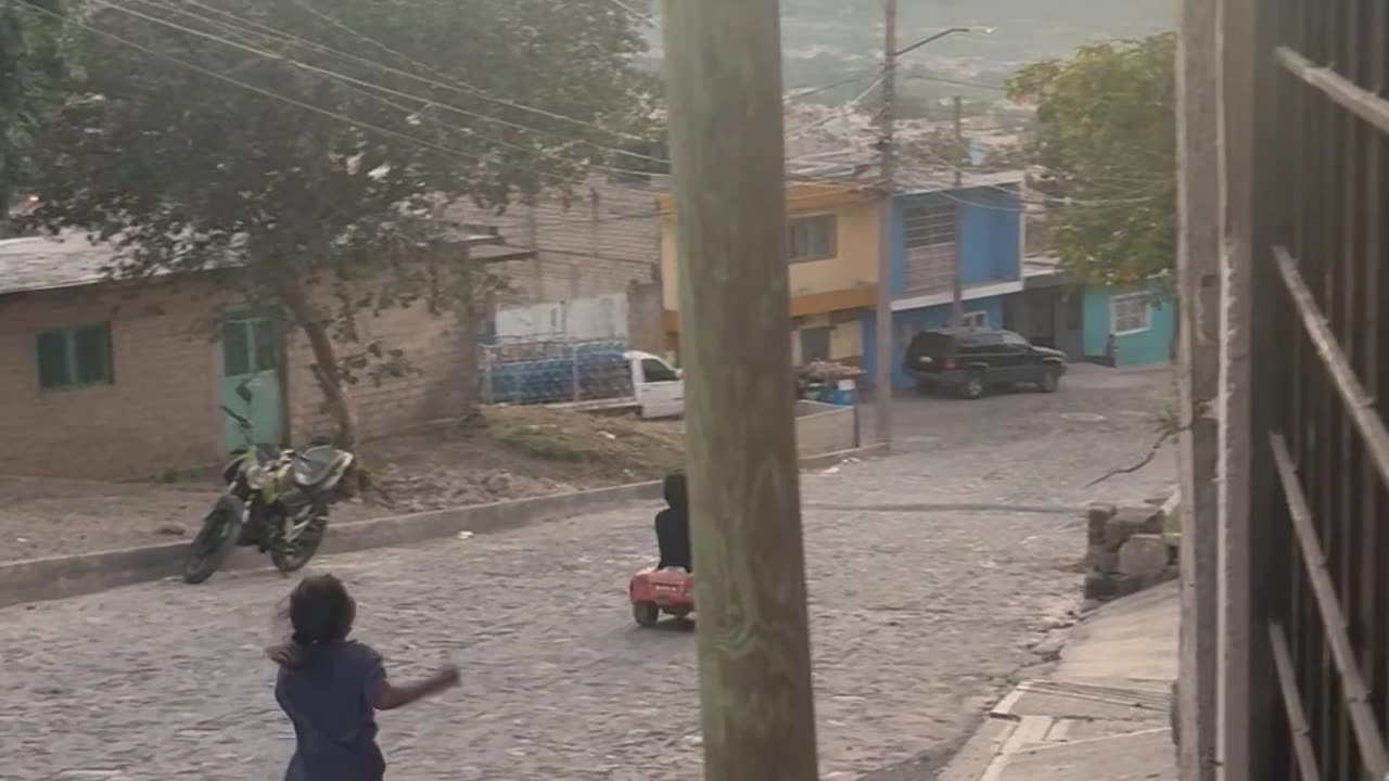 Kid Coasts Downhill In Runaway Toy Car