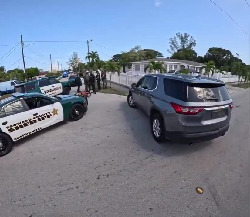 Florida cop nearly runs over a kid on a bike and aggressively tackles him to the ground👀🤯