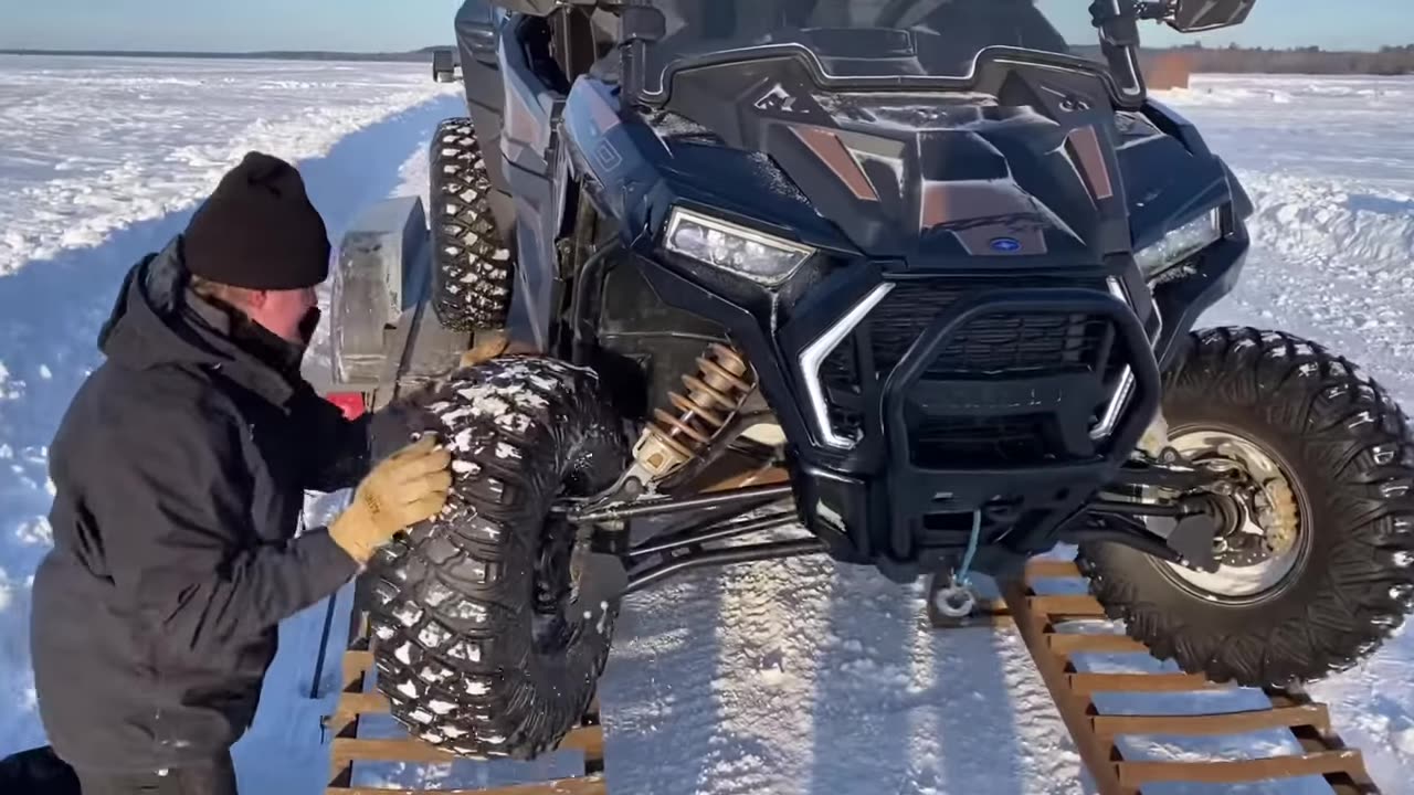 RZR on Reaper Wheels digs up Frozen Lake