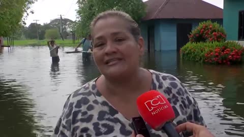 Floods submerge Colombian town after river swells from heavy rain