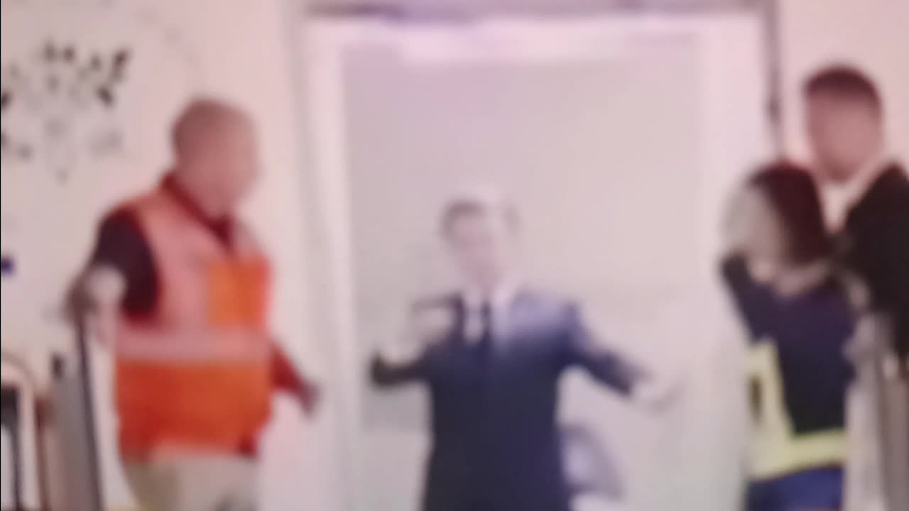 French leader macron gets pushed in face by wife