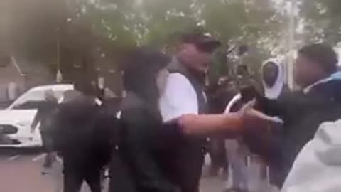 White woman was being ganged up on and then a man came to her aid and restore order