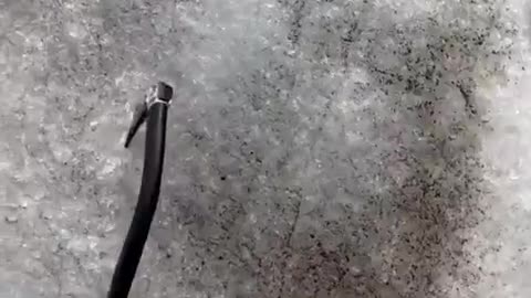Man ice climbs on the weekends