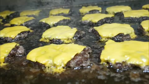 Sizzling & Melting: Grilling Burger Patties with Cheese Perfection 🍔🔥🧀