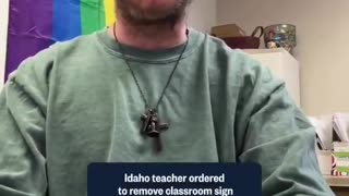 Transgender elementary school Seattle teacher flanked by a pride flag says classrooms