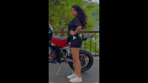 chubby sri Lankan girl dance with high capacity bike