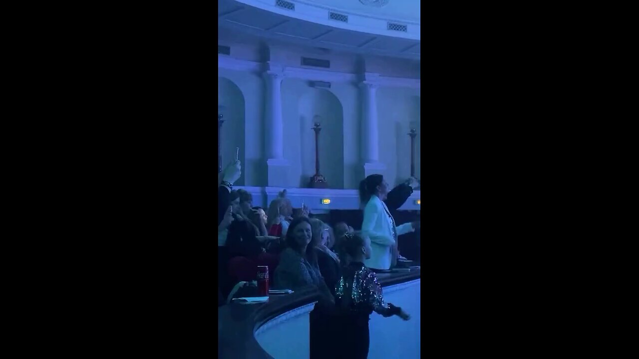 A concert attendee angrily pulled a woman's ponytail when she obstructed their view