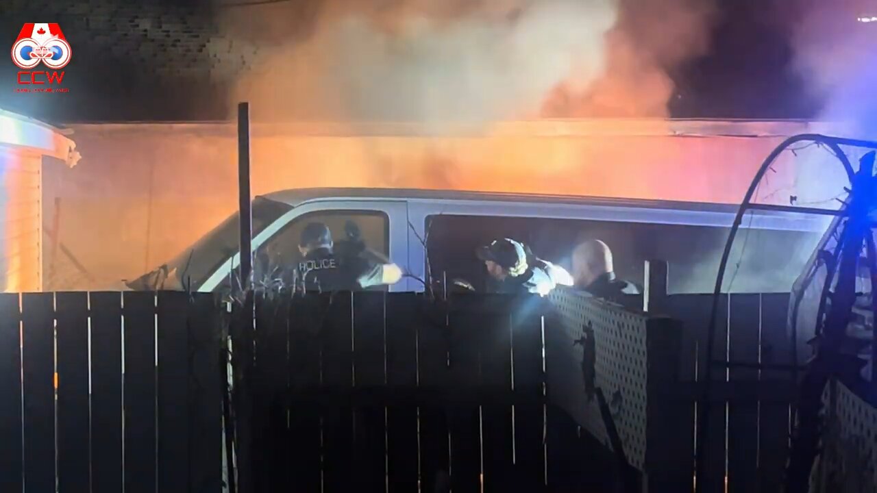 Police standoff ends in rescuing man from burning van