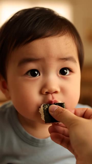 Baby tries Sushi for first time
