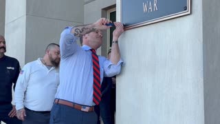 Hegseth installs new "Department of War" sign on the Pentagon.