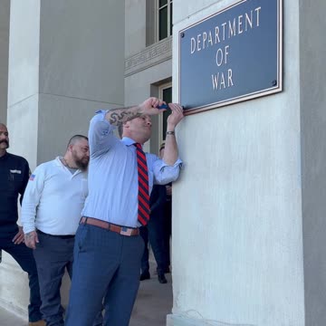 Hegseth installs new "Department of War" sign on the Pentagon.
