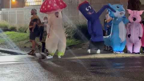 Inflatable Pikachu and Frog Embrace During Portland Protests
