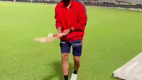 Virat juggling with bat