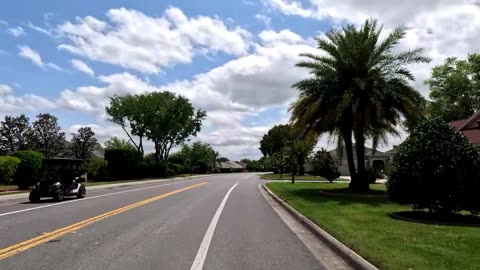 ON THE WAY TO THE OPEN HOUSE IN MY GOLF CART