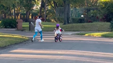 Daughter's Unforgettable Reaction To First Bike Ride