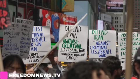 Protestors are currently waving foreign flags in Times Square protesting President Trump.