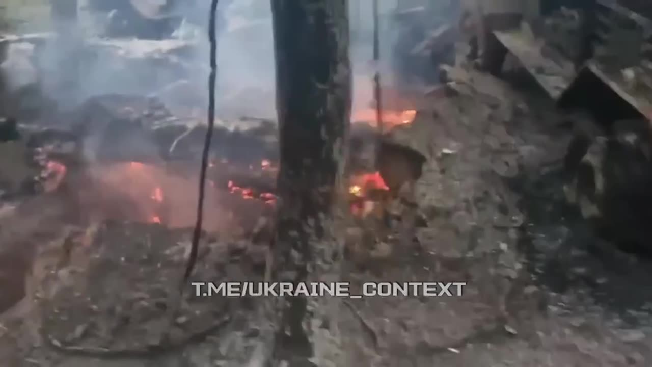 Dozens of Burning Vehicles Surround The Firey Hellscape of Russian Trenches