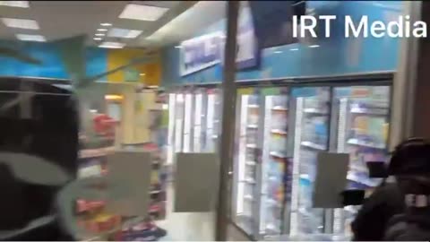 Store Owner in Los Angeles Can Do Nothing as Rioters Turn to Looting