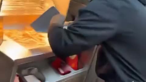 McDonald's manager is seen dozing off (apparently blood sugar) as Negroid steal their own meals