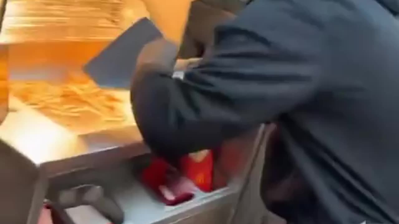 McDonald's manager is seen dozing off (apparently blood sugar) as Negroid steal their own meals